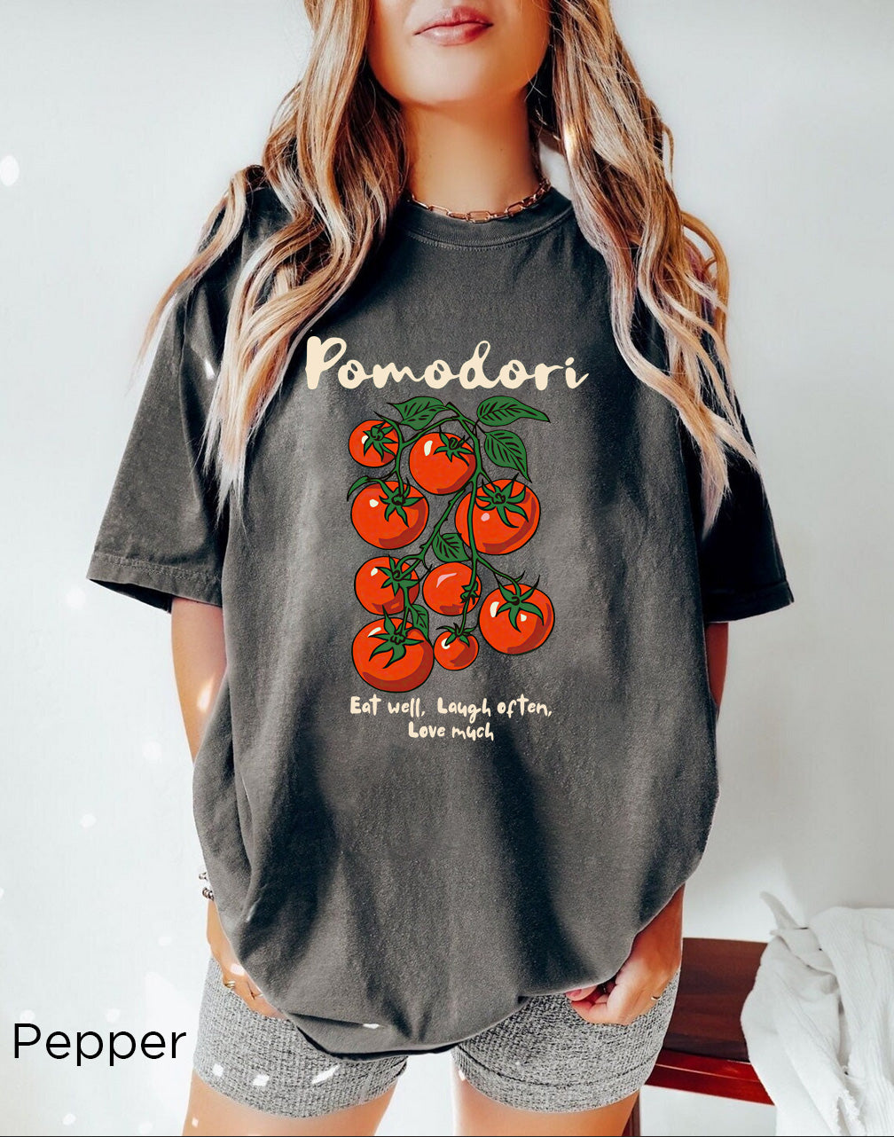 Pomodori tomato shirt styled as a casual Italian summer outfit with vibrant tomato graphic and Mediterranean-inspired aesthetic