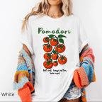 Front view of Pomodori tomato graphic t-shirt featuring colorful Italian-inspired tomato illustration on a Comfort Colors 1717 tee