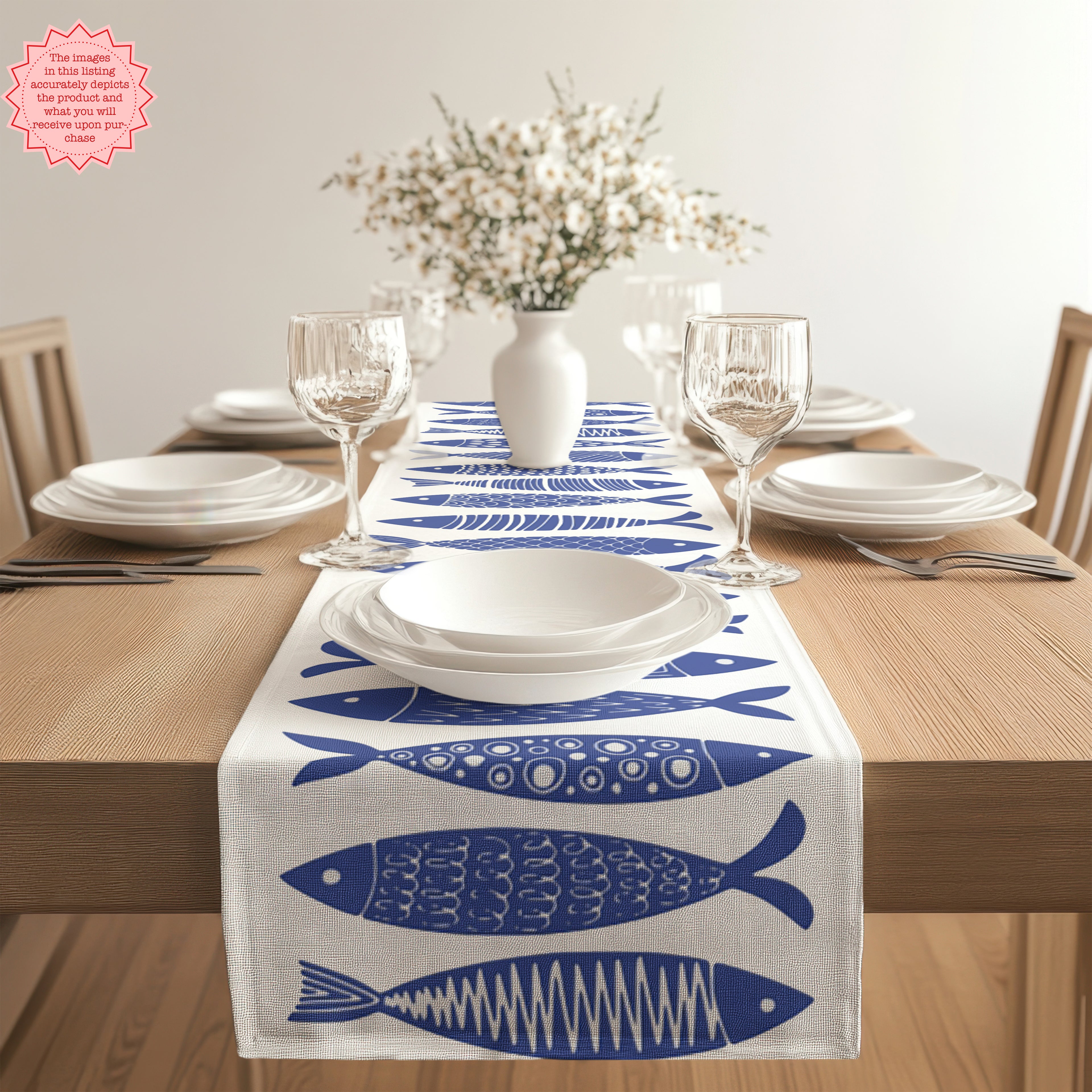 Coastal-inspired cotton table runner with blue fish print, perfect for holiday or everyday use.