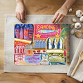 Mediterranean sardines glass cutting board featuring colourful modern fisherman collage artwork styled as coastal kitchen decor