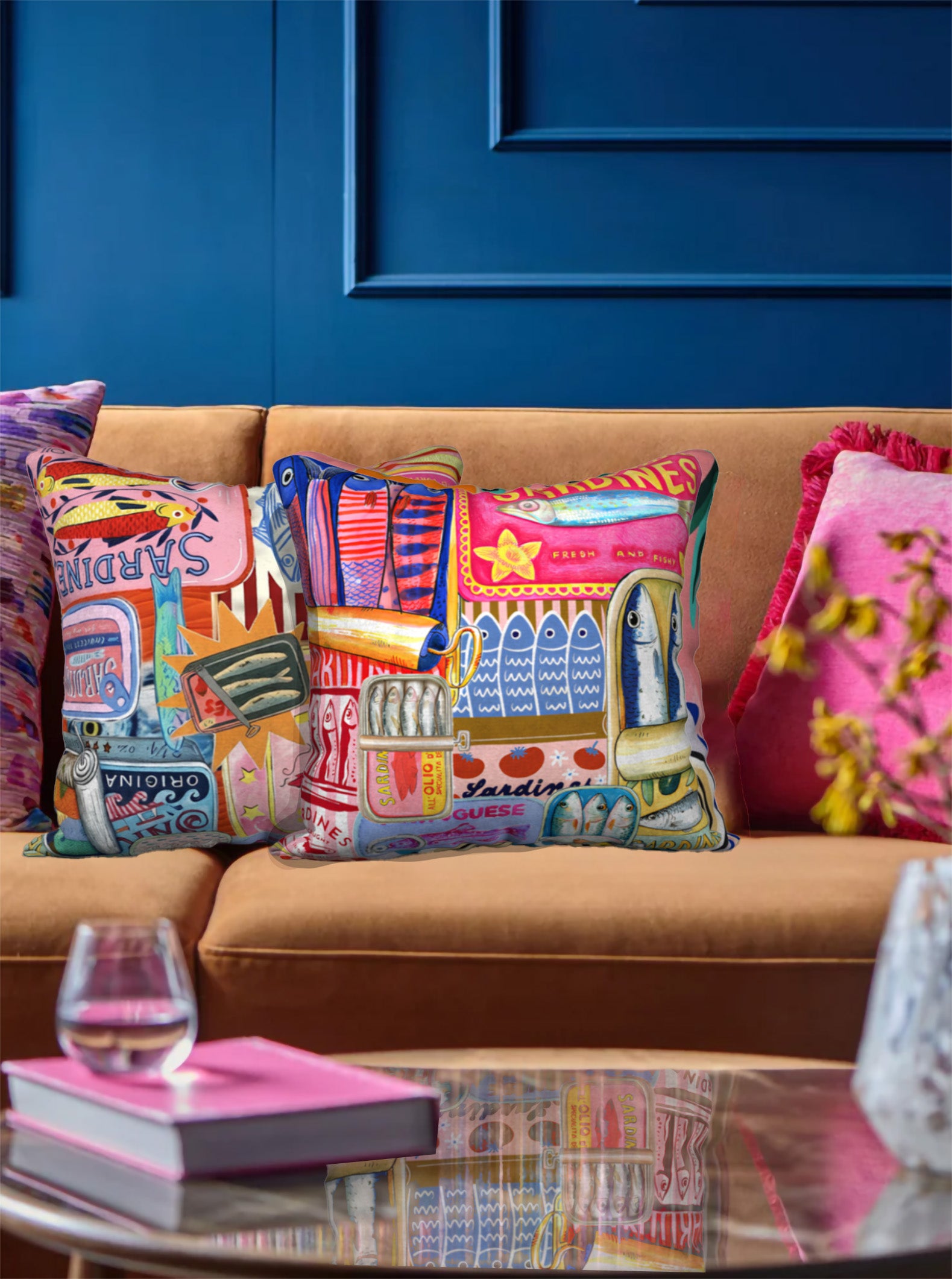 Sardines cushion featuring a fun and colorful design, styled with cozy home decor pieces. Ideal for Mediterranean-themed interiors.