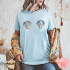 Cool chambray seashell graphic shirt, perfect for a laid-back, coastal aesthetic.
