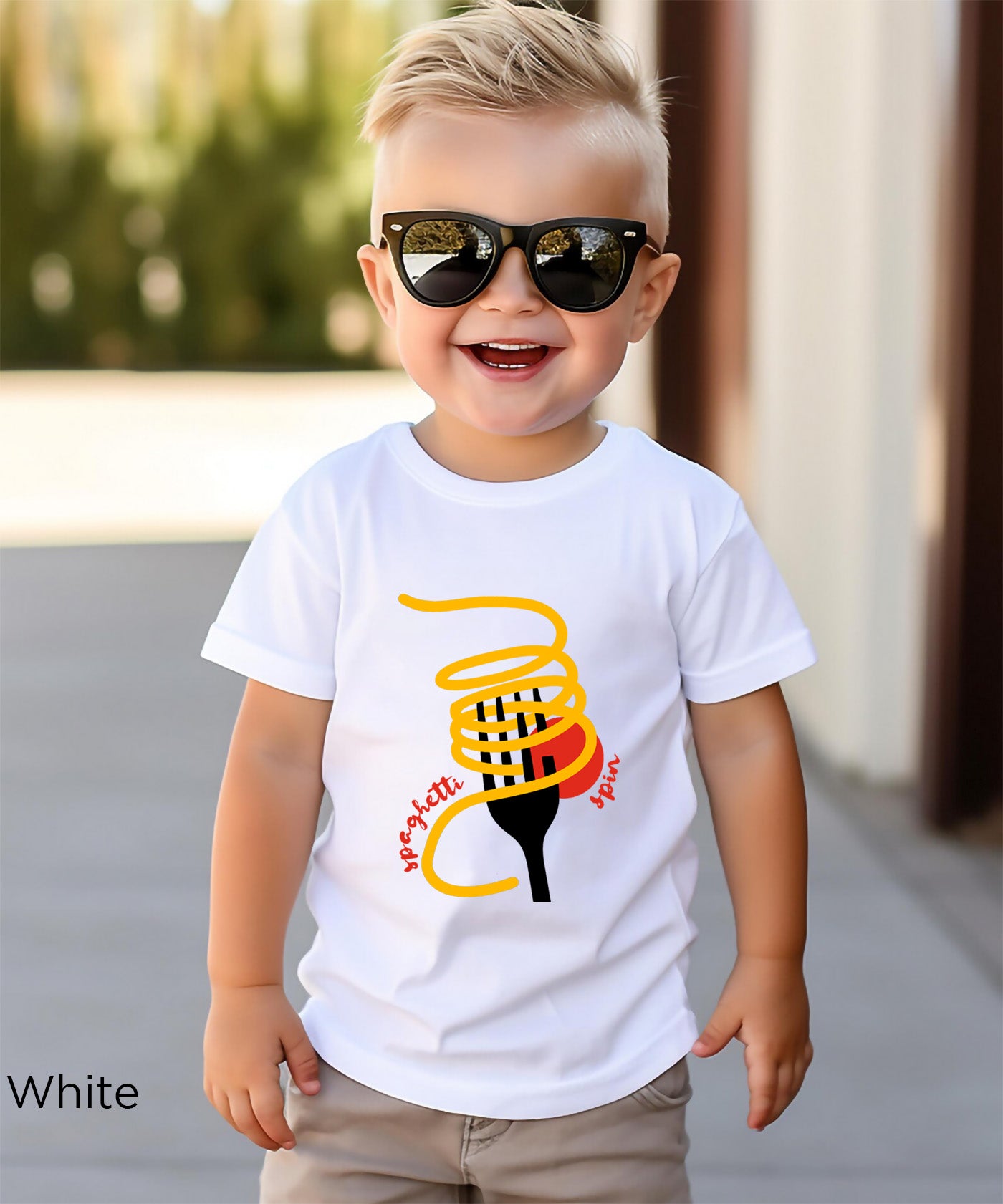 White kids spaghetti graphic T-shirt with “Tutto Bene” lettering and forked pasta illustration, colorful Italian food themed tee for toddlers and youth.