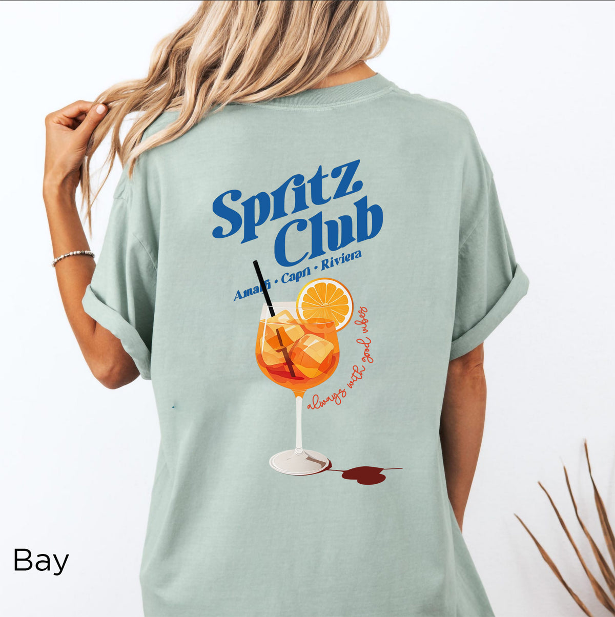 Spritz Club T-shirt back graphic showcasing a colorful cocktail illustration inspired by Italian summer and coastal aperitivo culture