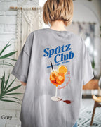 Spritz Club graphic tee showing the full back design with a colorful spritz illustration and summer vacation aesthetic