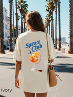 Spritz Club T-shirt back view featuring a large Mediterranean-inspired spritz cocktail graphic and vintage summer artwork