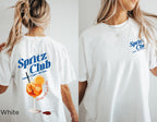 Spritz Club T-shirt with Mediterranean-inspired cocktail graphic printed on a relaxed-fit Comfort Colors 1717 tee