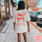 Matching That's Amore bridal party shirts with personalised names and event date, perfect for an Italian-themed hen party or wedding weekend.