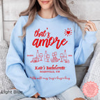 Light Blue ‘That’s Amore’ Bachelorette Sweatshirt, personalized with bride’s name and location.
