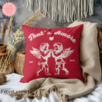 That's Amore Cupid Red Cushion on a neutral backdrop, designed with angels and hearts, ideal for Valentine's Day decor