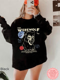 Vintage werewolf horror sweatshirt with retro Halloween monster design