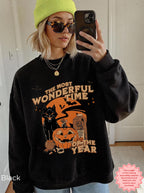 Vintage black cat Halloween sweatshirt with retro fall artwork