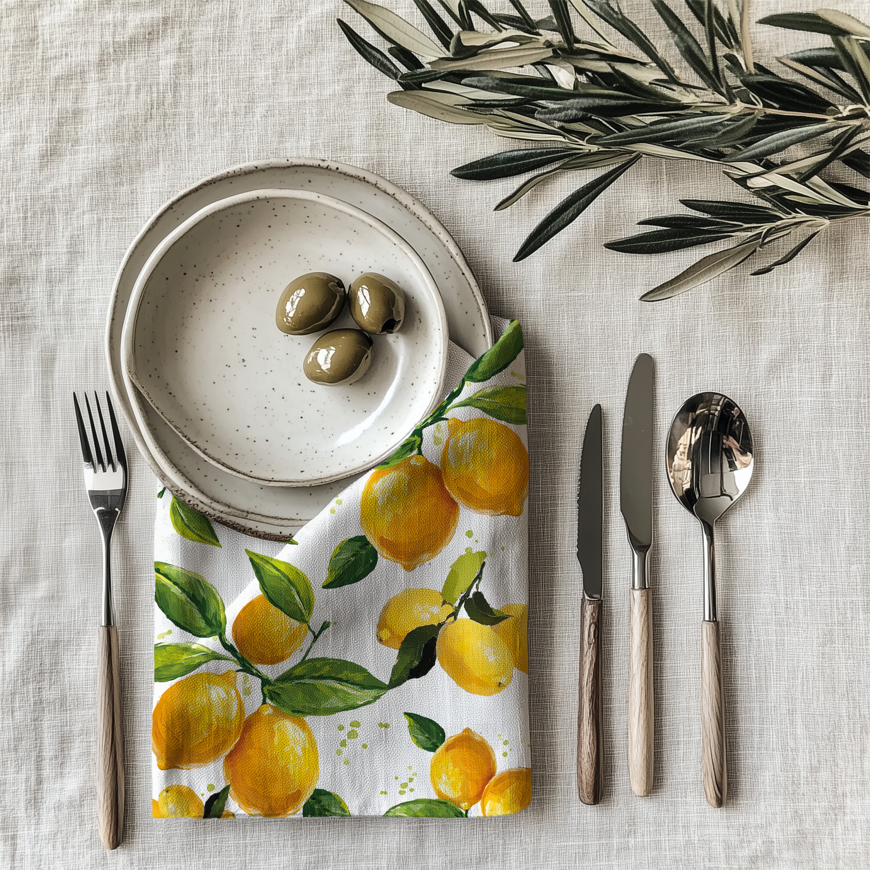 Yellow lemon patterned cloth napkin made from 100% cotton twill with clean hemmed edges for elegant table settings