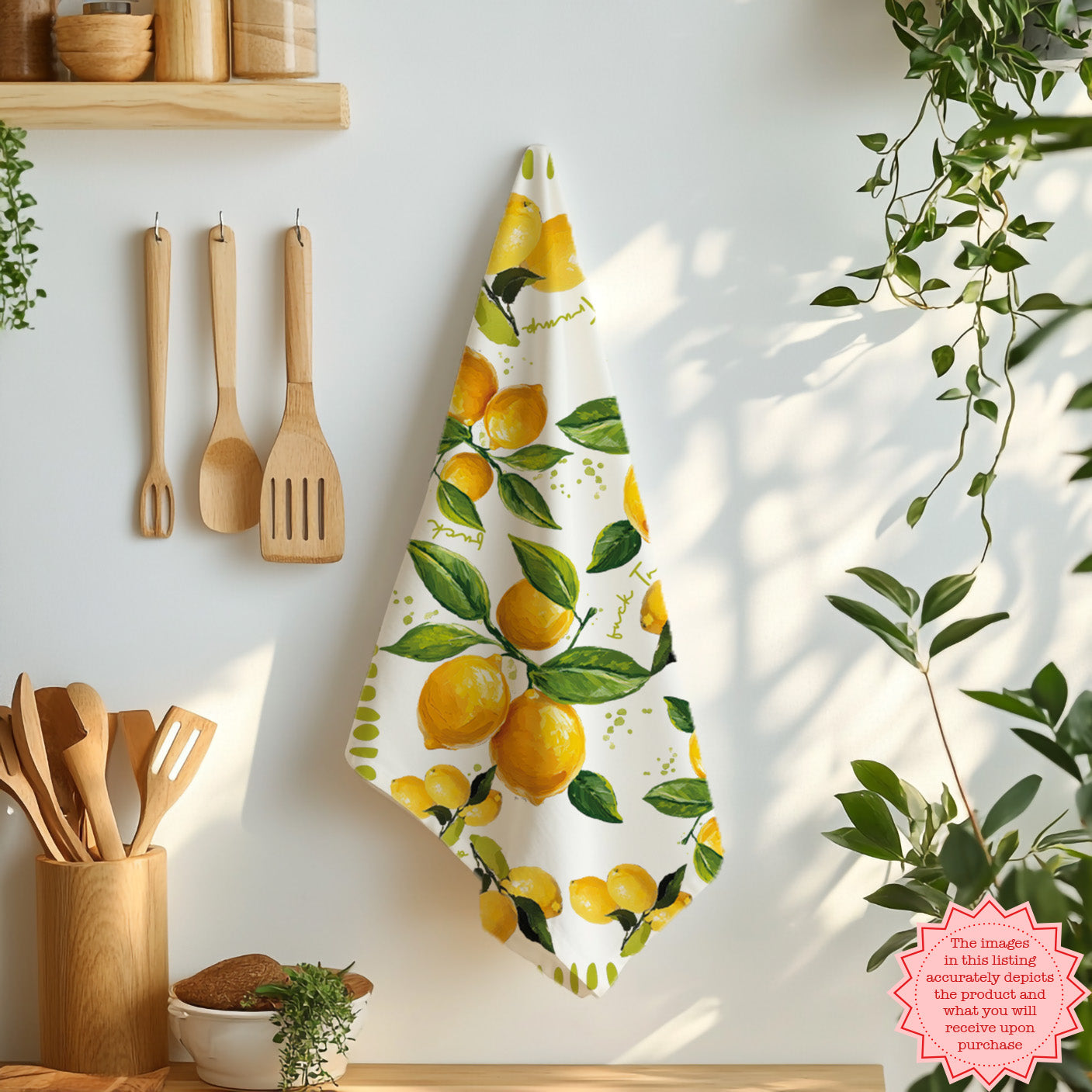 Artistic lemon kitchen towel hanging on oven handle in sunlit Mediterranean-style kitchen