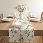 Watercolour Christmas table runner decorating a dining table for the holidays