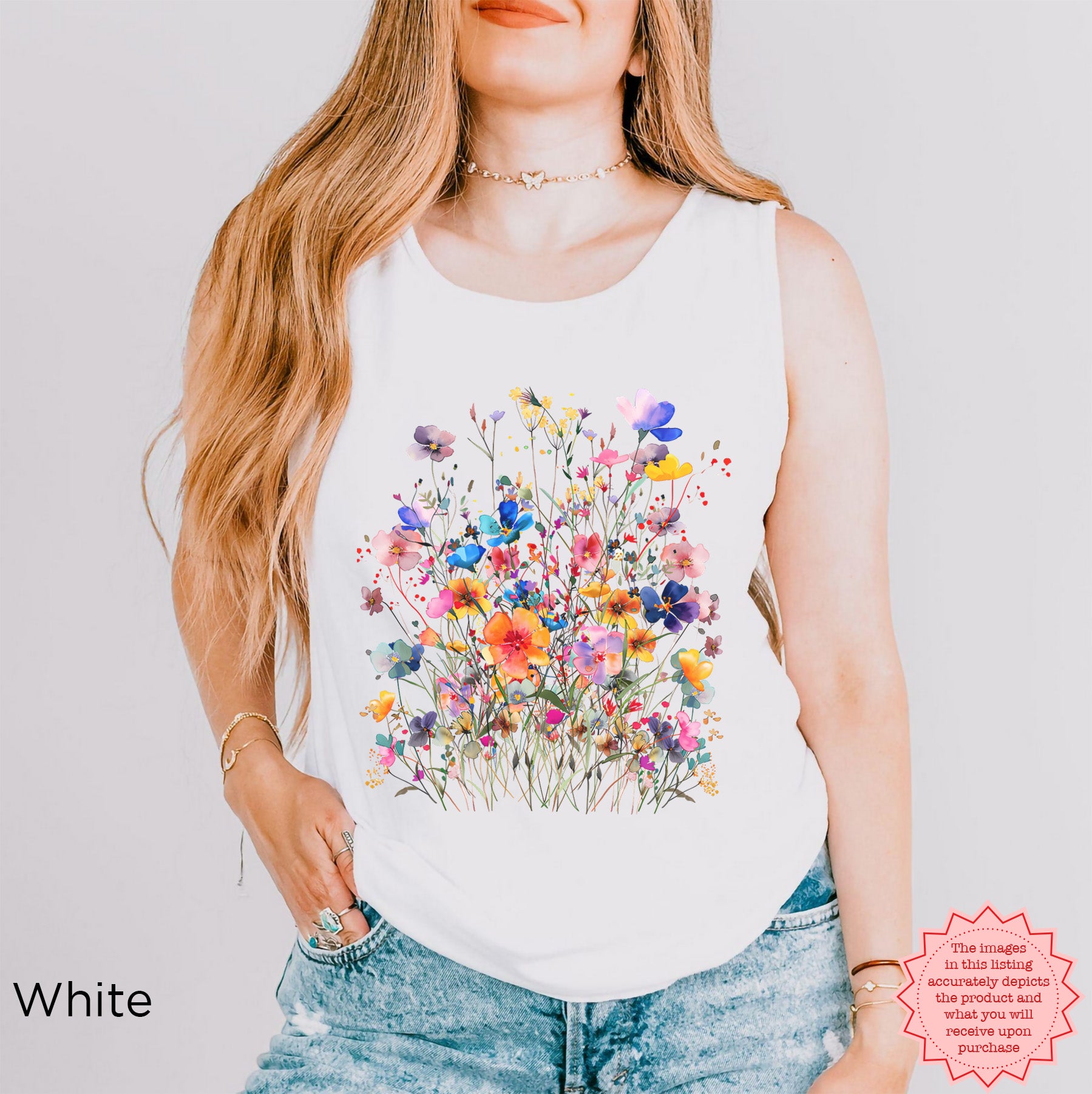 White Comfort Colors floral tank top with colorful watercolor wildflower illustration, soft botanical summer shirt for women with relaxed cottagecore style.