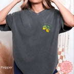 Fun and fresh citrus embroidery shirt in a sleek pepper color, ideal for casual summer outfits.