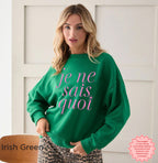 Woman wearing Irish green Je Ne Sais Quoi sweatshirt, cozy crewneck for stylish streetwear